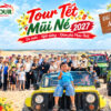 Khách đoàn của Helitour chụp hình kỉ niệm với Đồi Cát Trắng Mũi Né